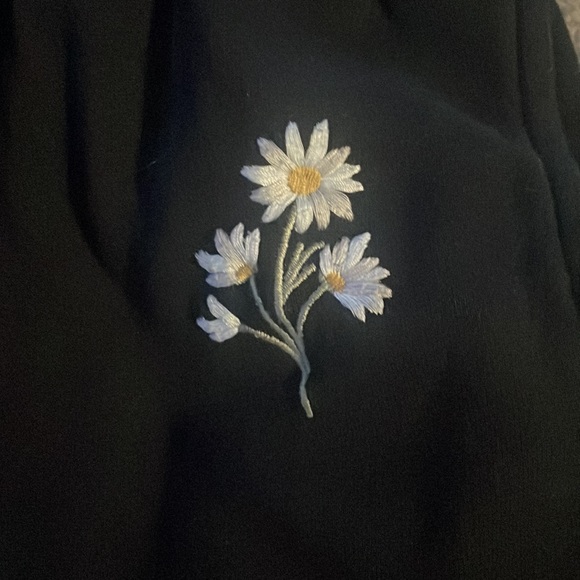 Black sweet pants with Daisy’s on them - Picture 3 of 3